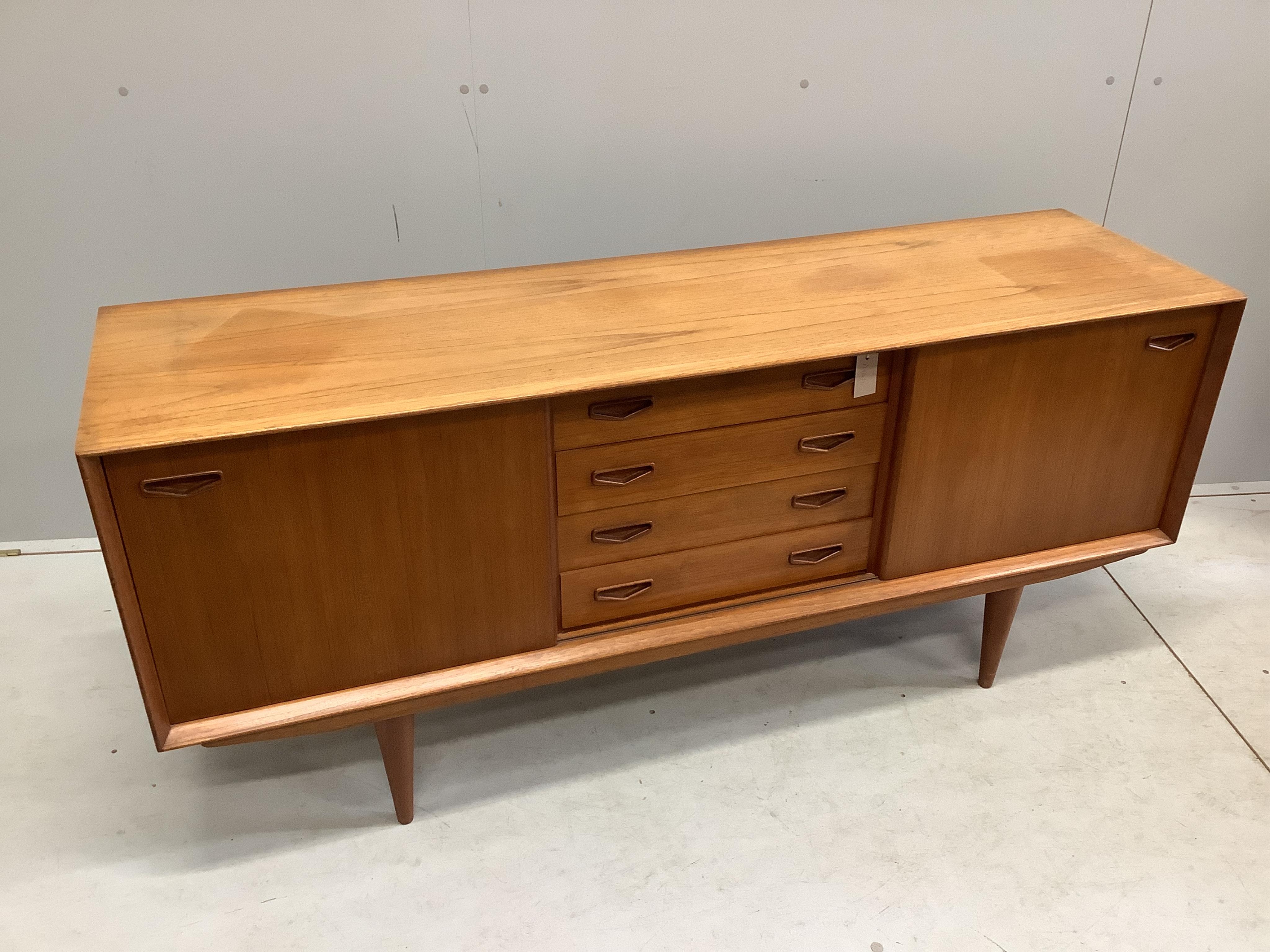 Clausen & Son, a mid century Danish teak sideboard, width 160cm, depth 45cm, height 70cm. Condition - fair